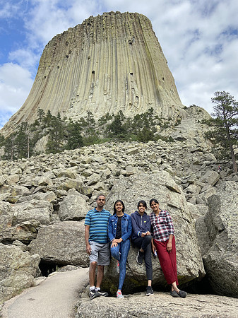 Tiny humans in front of Devil's Tower